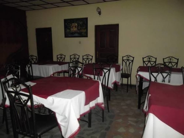 Imagen del bar/restaurante del Hotel Nima Suites. Foto 2