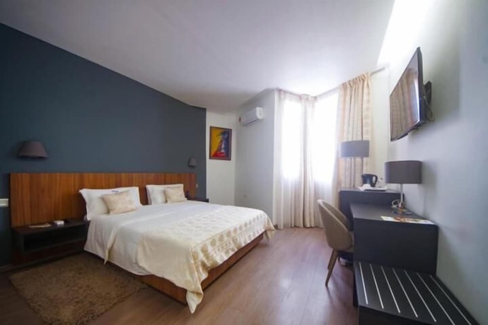 Imagen de la habitación del Hotel Nina. Foto 3