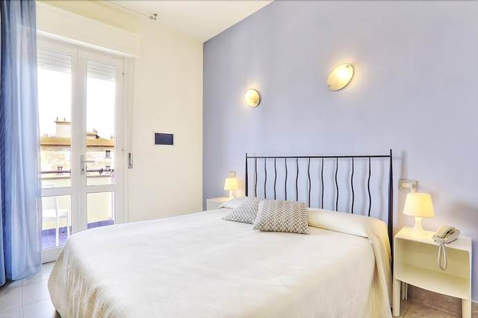 Imagen de la habitación del Hotel Nina, Marina di Bibbona. Foto 7