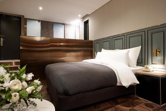 Imagen de la habitación del Hotel Nine Brick Hotel. Foto 16