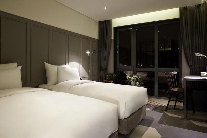 Imagen de la habitación del Hotel Nine Brick Hotel. Foto 19