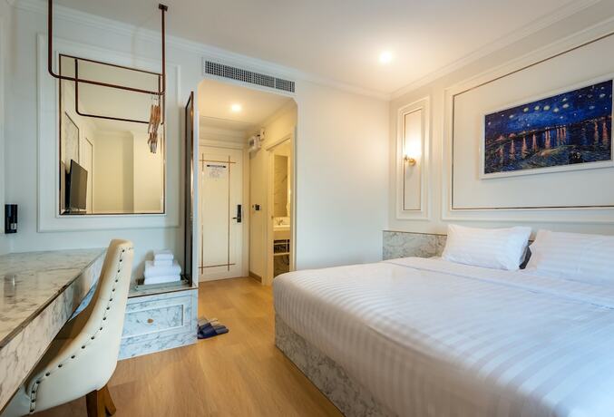 Imagen de la habitación del Hotel Nine River. Foto 17