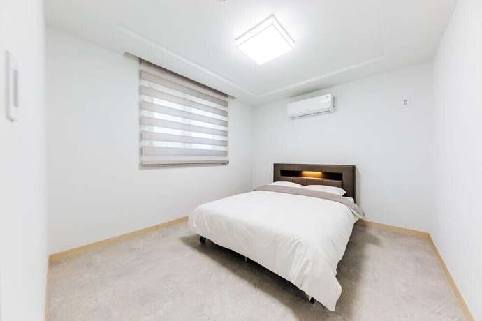 Imagen de la habitación del Hotel Nine to zero Pension. Foto 4