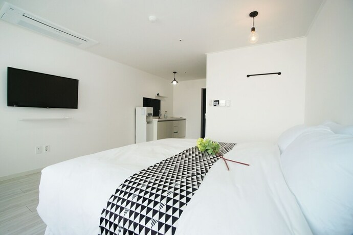 Imagen de la habitación del Hotel Ninespavill. Foto 17