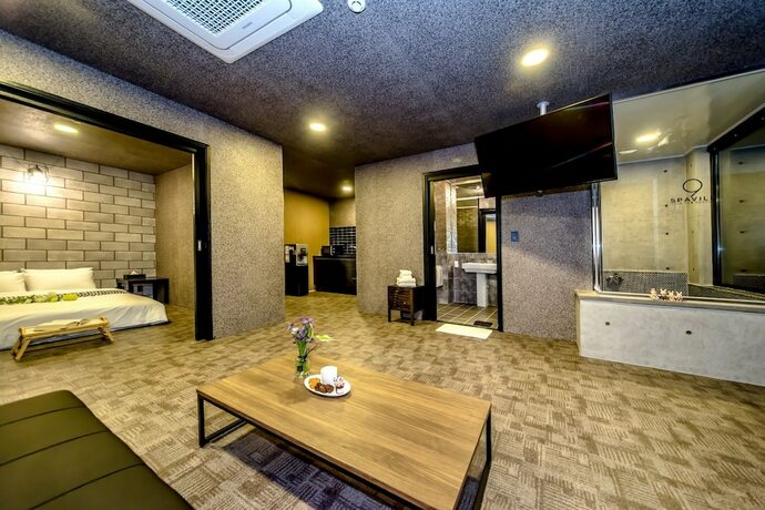 Imagen de la habitación del Hotel Ninespavill. Foto 19