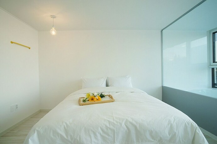 Imagen de la habitación del Hotel Ninespavill. Foto 20