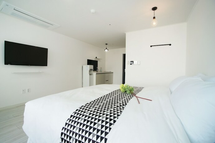 Imagen de la habitación del Hotel Ninespavill. Foto 21