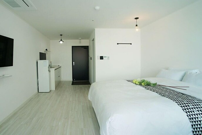 Imagen de la habitación del Hotel Ninespavill. Foto 35