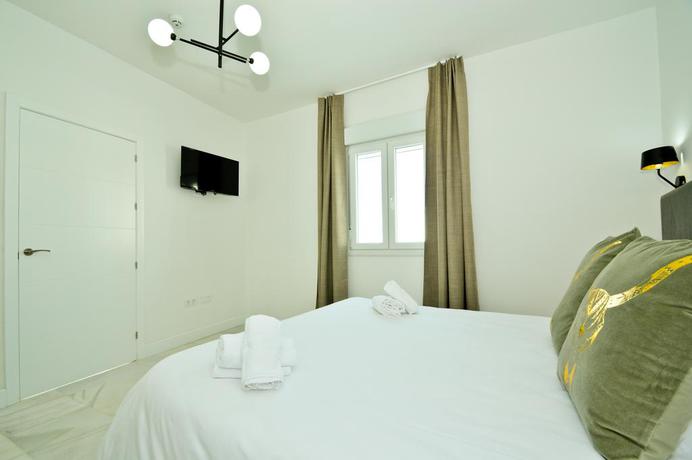 Imagen de la habitación del Hotel Ninesuites. Foto 14