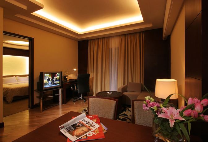Imagen de la habitación del Hotel Ningbo Portman Plaza. Foto 7
