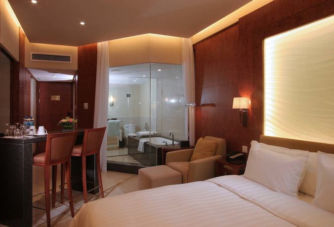 Imagen de la habitación del Hotel Ningbo Portman Plaza. Foto 11