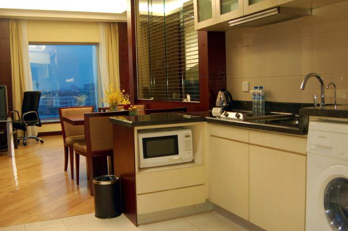 Imagen de la habitación del Hotel Ningbo Portman Plaza. Foto 14