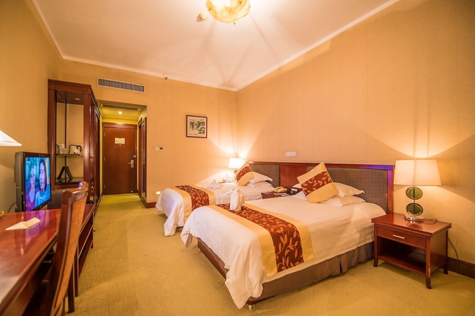 Imagen de la habitación del Hotel Ninghai New Century. Foto 4