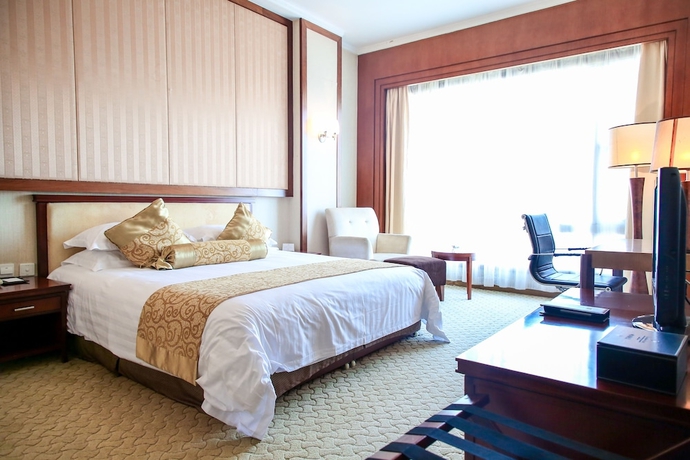 Imagen de la habitación del Hotel Ninghai New Century. Foto 6