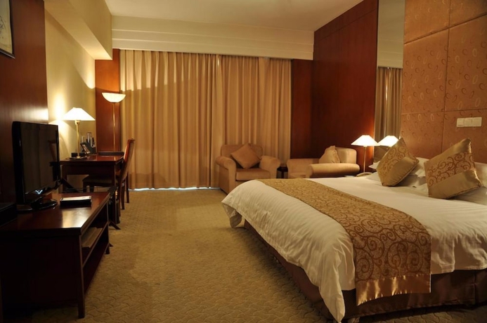 Imagen de la habitación del Hotel Ninghai New Century. Foto 7