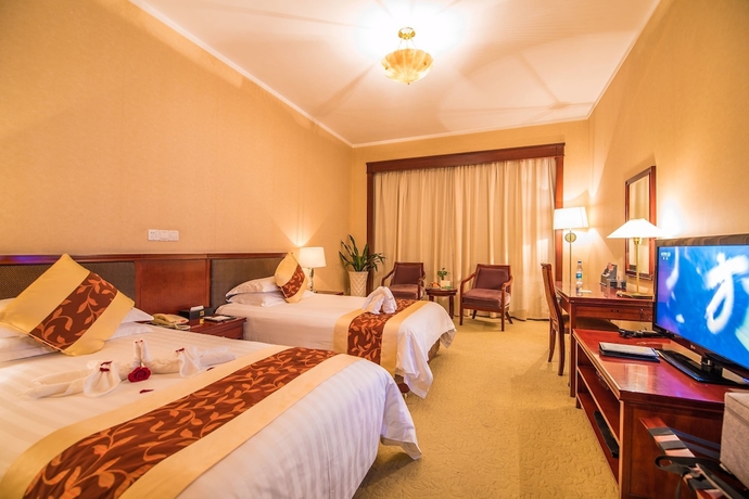 Imagen de la habitación del Hotel Ninghai New Century. Foto 8