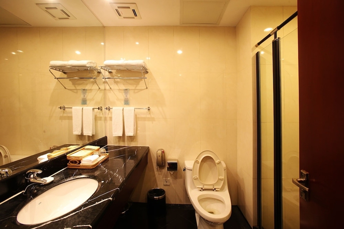 Imagen de la habitación del Hotel Ninghai New Century. Foto 13