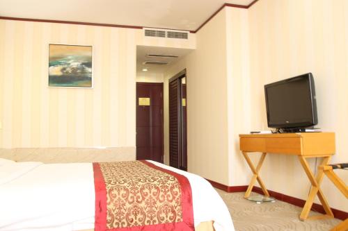 Imagen de la habitación del Hotel Ninghe Tianjin. Foto 3