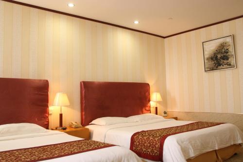 Imagen de la habitación del Hotel Ninghe Tianjin. Foto 6