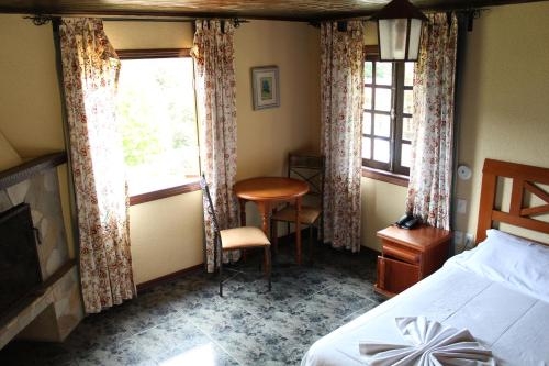 Imagen de la habitación del Hotel Ninho Do Falc&atilde;o, Monte Verde. Foto 7
