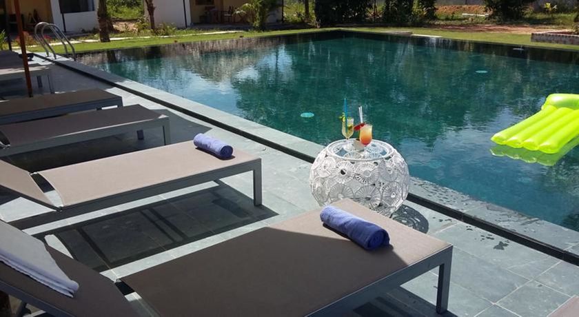 Imagen de los exteriores del Hotel Ninila Fruit Farm Bungalow. Foto 9