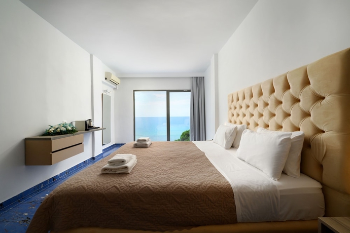 Imagen de la habitación del Hotel Ninos Grand Beach and Resort. Foto 6