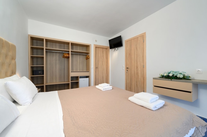 Imagen de la habitación del Hotel Ninos Grand Beach and Resort. Foto 7