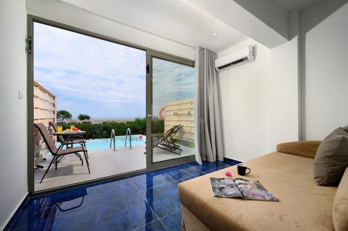 Imagen de la habitación del Hotel Ninos Grand Beach and Resort. Foto 9