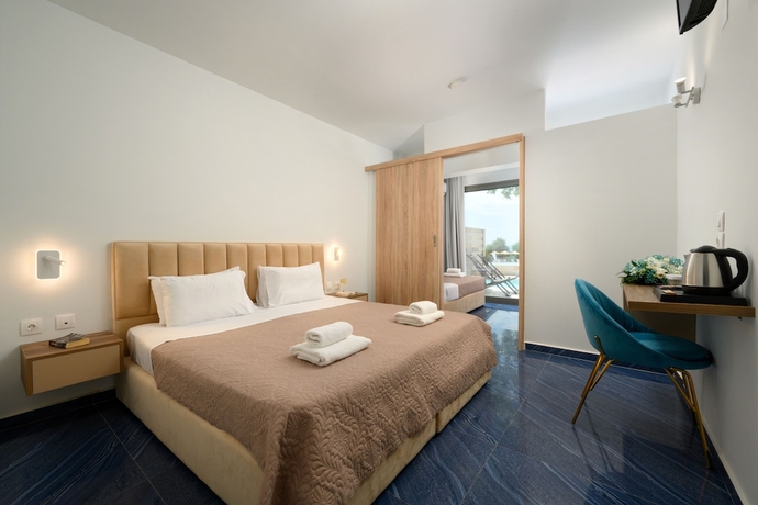 Imagen de la habitación del Hotel Ninos Grand Beach and Resort. Foto 12