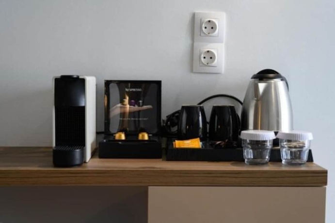 Imagen de la habitación del Hotel Ninos Grand Beach and Resort. Foto 15