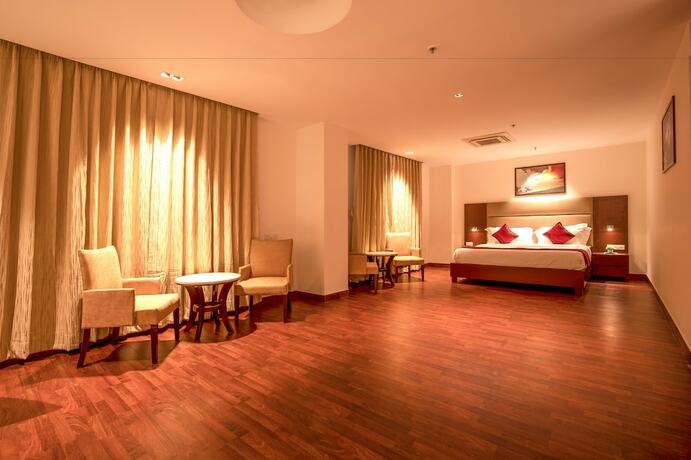 Imagen de la habitación del Hotel Nio By Tarika Sector-1, Noid. Foto 17