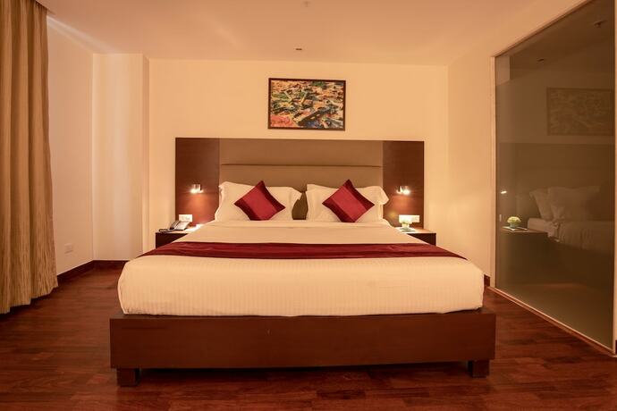 Imagen de la habitación del Hotel Nio By Tarika Sector-1, Noid. Foto 18