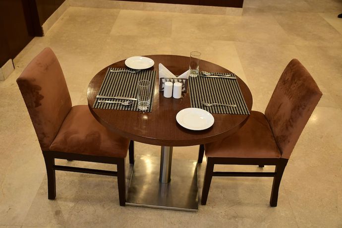 Imagen del bar/restaurante del Hotel Nio By Tarika, Sector-1, Noida. Foto 1