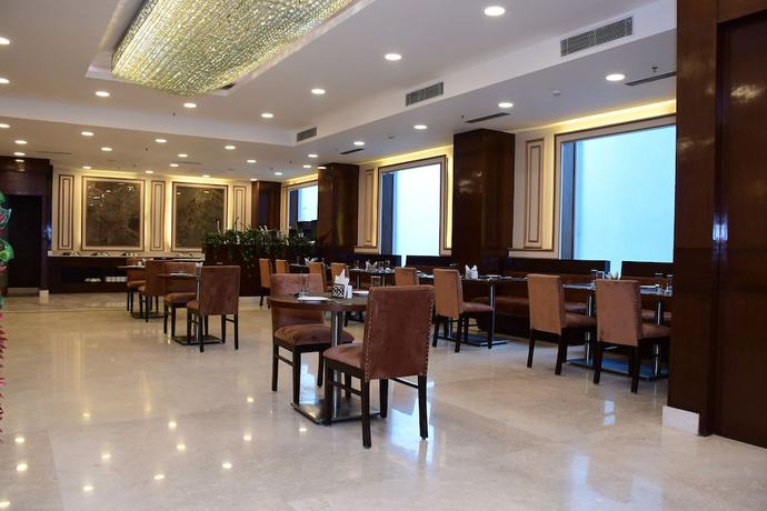 Imagen del bar/restaurante del Hotel Nio By Tarika, Sector-1, Noida. Foto 5