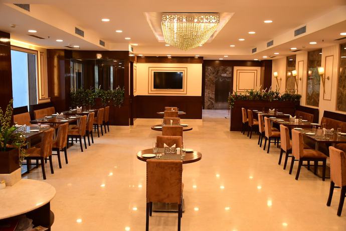 Imagen del bar/restaurante del Hotel Nio By Tarika, Sector-1, Noida. Foto 6