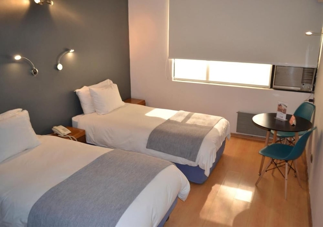 Imagen de la habitación del Hotel Nippon, Santiago Centro. Foto 14