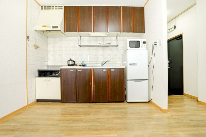 Imagen de la habitación del Hotel Nipponbashi Super House. Foto 18