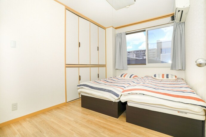 Imagen de la habitación del Hotel Nipponbashi Super House. Foto 20