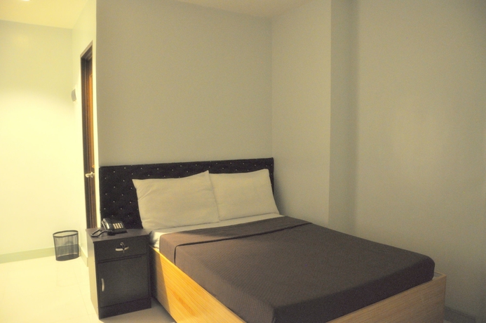Imagen de la habitación del Hotel Nirain Suites. Foto 6