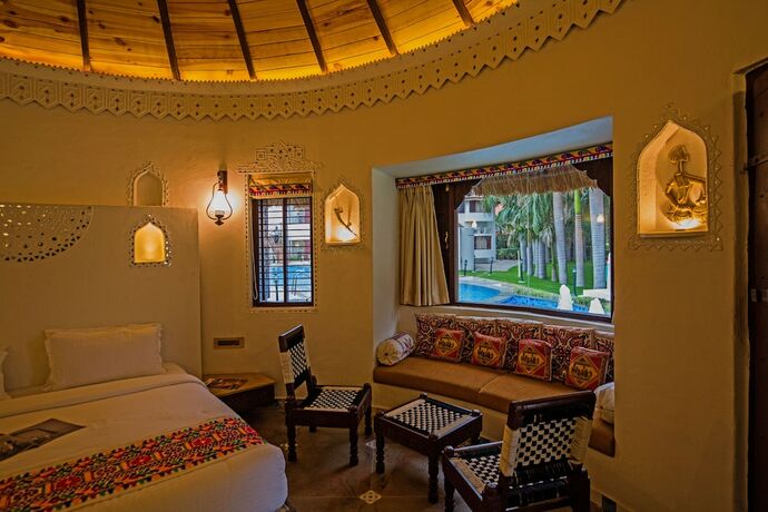 Imagen de la habitación del Hotel Nirali Resorts. Foto 21