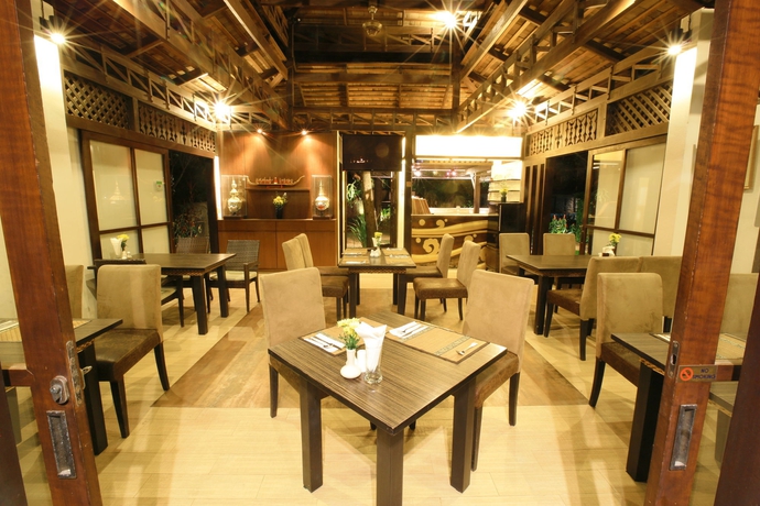 Imagen del bar/restaurante del Hotel Niramaya Villa and Wellness. Foto 2