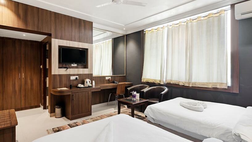 Imagen de la habitación del Hotel Niranjana. Foto 21