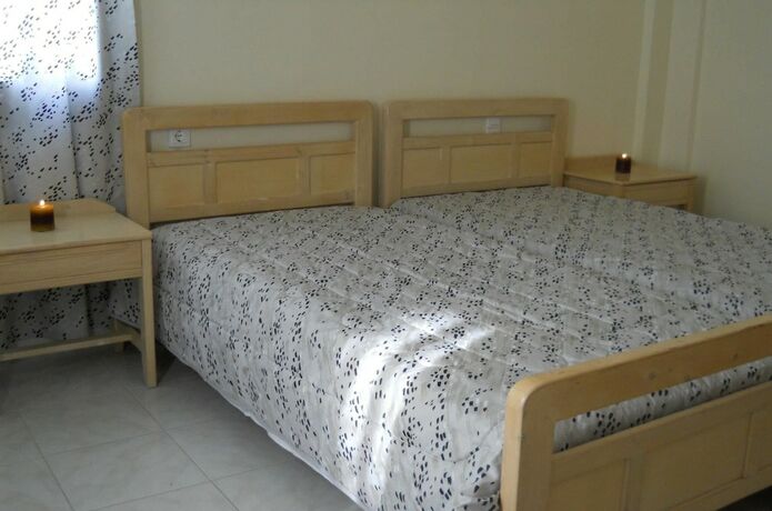 Imagen de la habitación del Hotel Niriedes Dionyssos Village. Foto 20