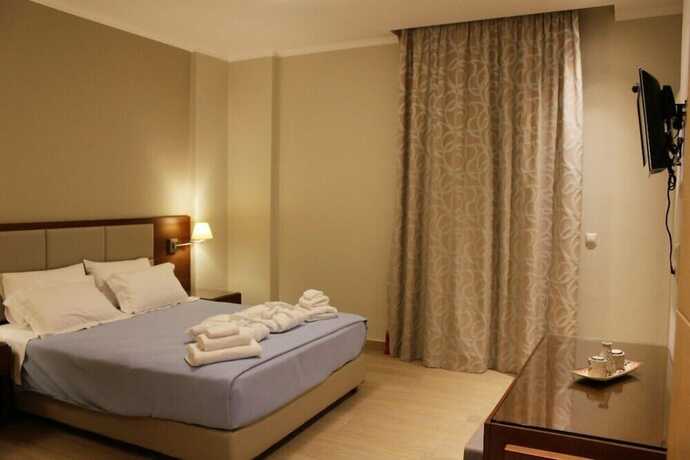 Imagen de la habitación del Hotel Niriides Luxury Villas. Foto 14