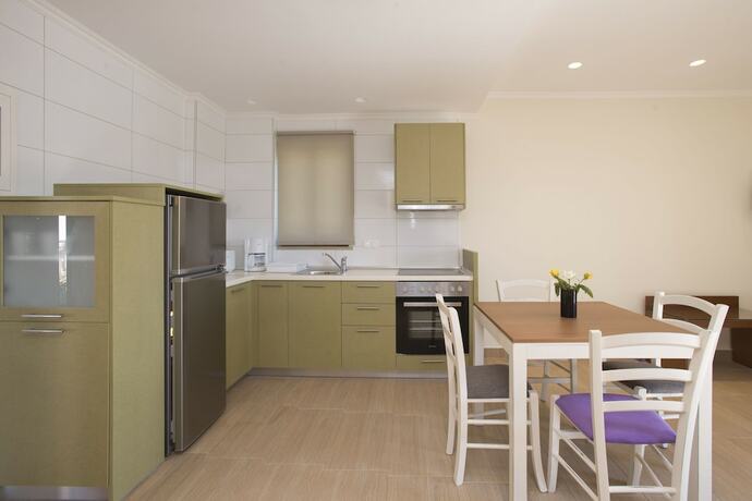 Imagen de la habitación del Hotel Niriides Luxury Villas. Foto 16