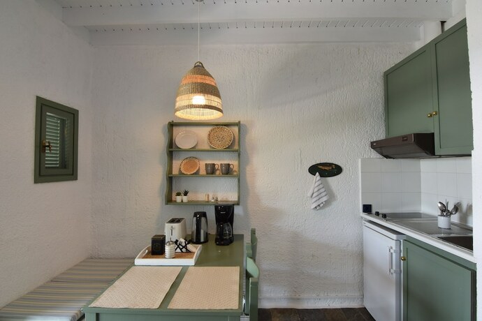 Imagen de la habitación del Hotel Niriides Villas. Foto 18