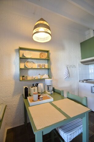 Imagen de la habitación del Hotel Niriides Villas. Foto 20