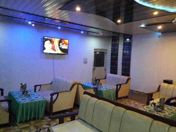 Imagen del bar/restaurante del Hotel Nirmal Lodge. Foto 4