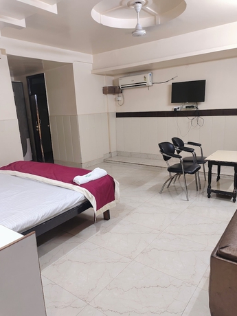 Imagen de la habitación del Hotel Nirmal Palace. Foto 10