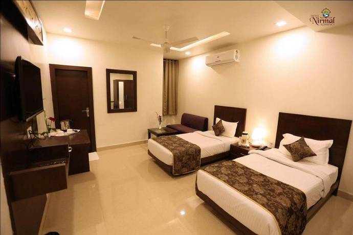 Imagen de la habitación del Hotel Nirmal Residency. Foto 17
